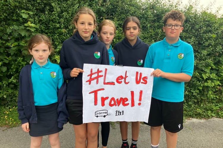 Let Us Travel staged a demonstration outside a school in Beulah to protest against the changes to the school bus policy