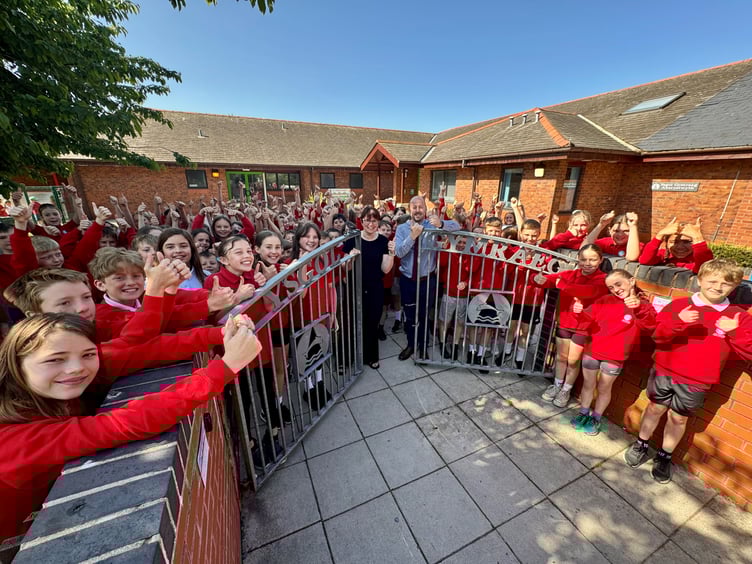 Ysgol Gymraeg Aberystwyth headteacher Gareth James and deputy headteacher Caryl Jones with some of the pupils from Ysgol Gymraeg