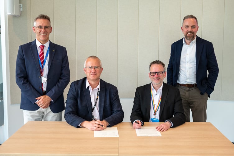 Prof Iain Barber and Prof Jon Timmis Vice-Chancellor of Aberystwyth University, Dr Phil Kloer Hywel Dda Chief Executive and Dr Leighton Phillips