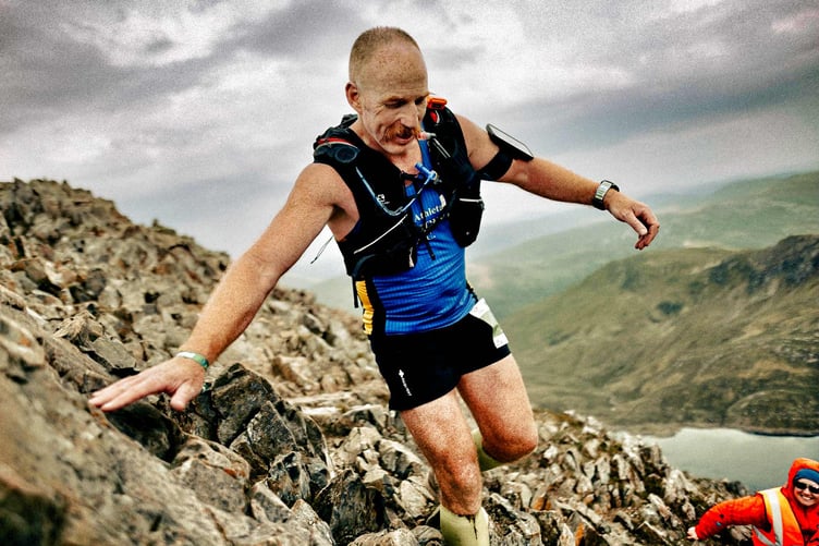 Richard Anthony balancing his descent