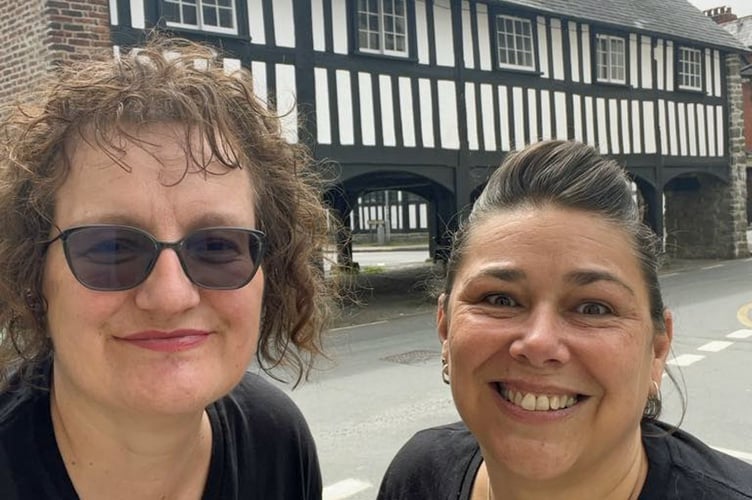 Beyond Breakout founders Jo Woodall (left) and Lorna Morris with the Old Market Hall, Llanidloes in the background.