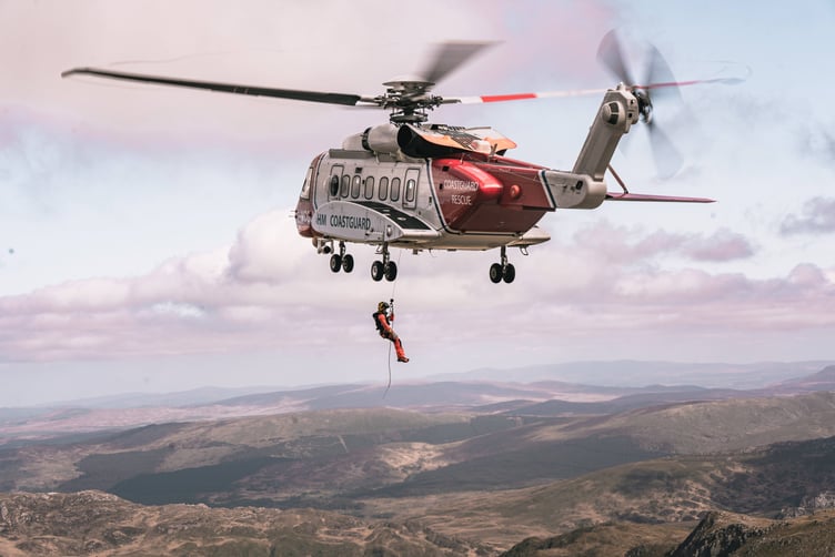 Maritime and Coastguard R936 helicopter with winch paramedic. Photo: Darlun and BBC Cymru Wales
