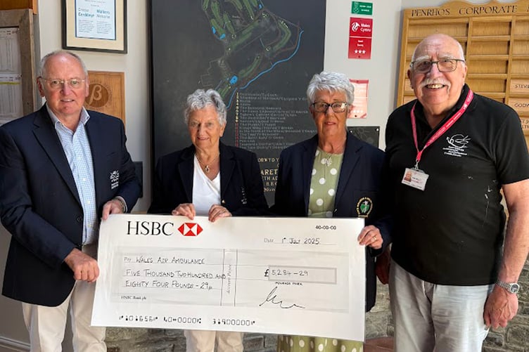 Left to right: Rowland Rees-Evans, captain; Elspeth Evans, president; Janet Parker, lady captain and Roger Staite representing  Wales Air Ambulance