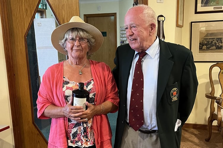 Gill Jones and club president Mike Roberts