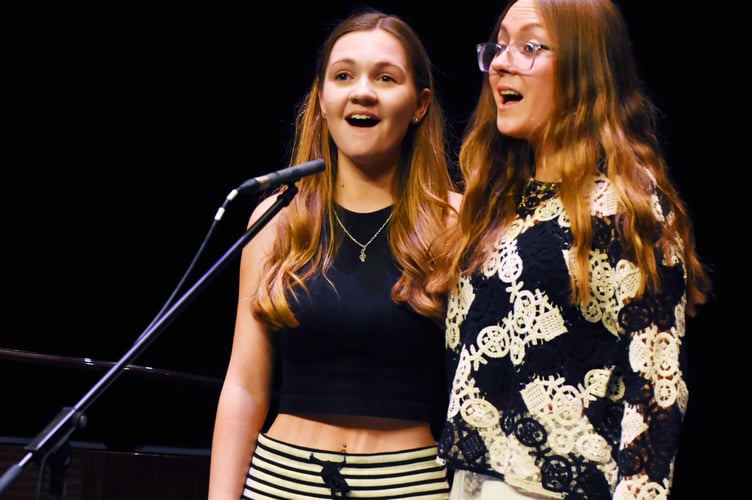 Cardigan sisters Lucy and Emma Davies-Warhurst won the duet, trio or quartet singing competition