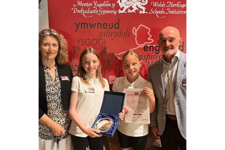 Pupils and teachers from New Quay Primary School receiving their award.