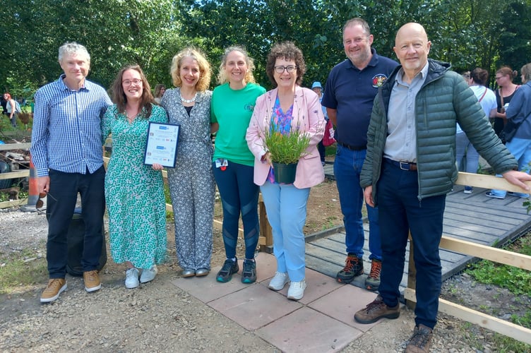 Michael Allman, Chair of Plascrug School's governing body, Hannah Lee and Joanna Jordan from the PTA, Headteacher Carol Macy, Elin Jones MS,  Steve Williams, Aberystwyth Town Council Assets and Facilities Manager, and Cllr Alun Williams. Photo: Julie McNicholls Vale