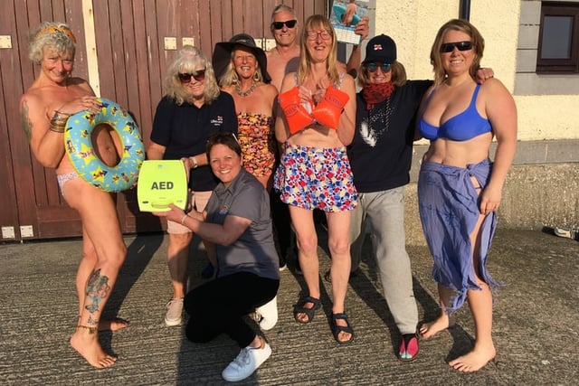 Defibrillator installed in Borth thanks to calendar girls and boys