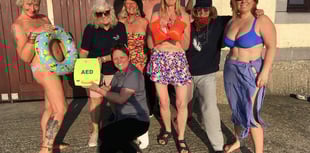Defibrillator installed in Borth thanks to calendar girls and boys