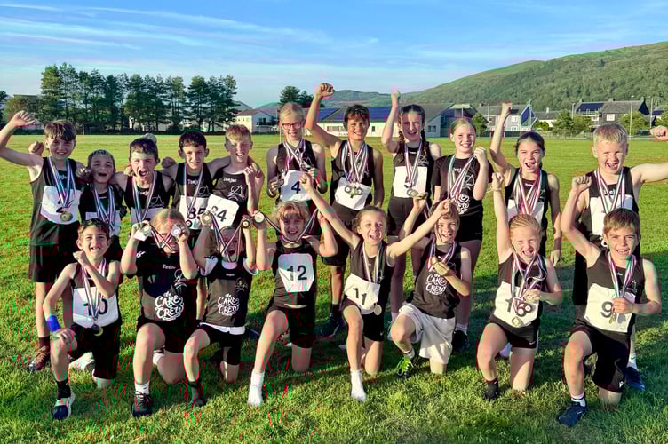 Pupils from Years 3 to 6 representing Ysgol Godre'r Berwyn at the annual Urdd Meirionnydd Athletics competition in Harlech