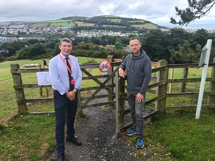 Mark Stevens and Councillor Shelley Childs next to one of the gates on the NLW path which will be removed as part of works to improve walking and cycling access on this route.