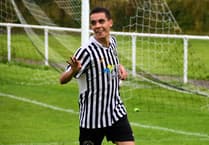 Rhys Hughes shines with hat-trick