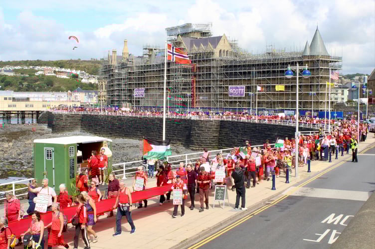 On 26 July the Red Line protest came to Aberystwyth. An estimated 1,200 people joined the march in solidarity with the Palestinian people, the 'Red Line' created with a 500m banner to symbolise "the red lines that have been crossed in Gaza"