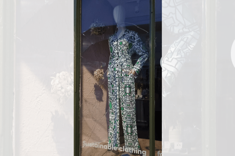 A window was smashed at the newly opened sustainable clothing shop on Machynlleth's main street Heol Maengwyn, Gweni Gwyllt