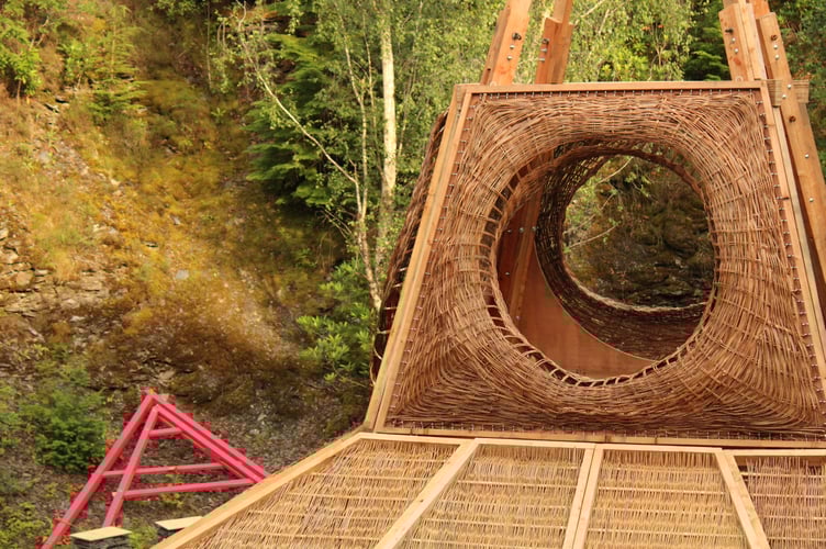 Woven Willow Panels adorn the timber structure. Photo: Centre for Alternative Technology