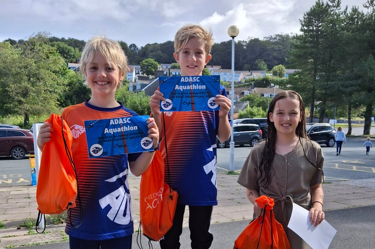 Year 6 and under podium winners, Dylan, Owen and Sophia.