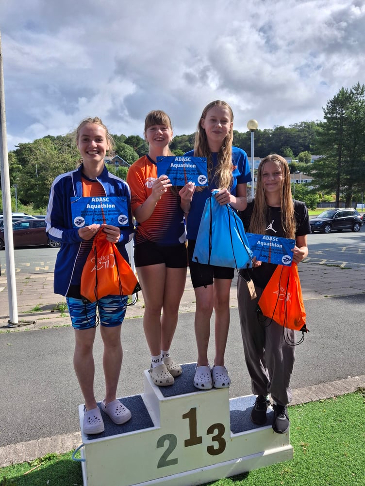 Year 7 and 8 podium winners, Gwerfyl and Lili, Gwennan and Kaya.