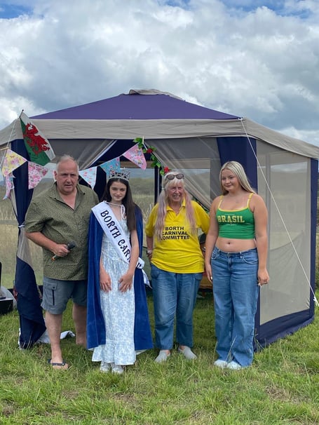 Former Ceredigion MP Mark Williams, Flo Everard Walker, Carnival Committee chair Carol Bainbridge, and last year's Carnival Queen Grace Thomas
