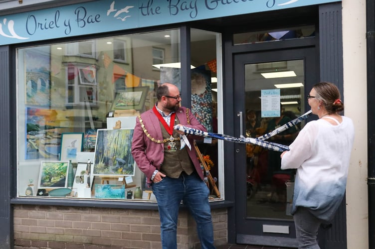 Aberystwyth mayor Cllr Emlyn Jones and The Bay Gallery owner Jeni Pain officially open the venue. Photo: Claire Stott