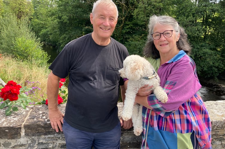 The Reverend Canon Delyth Wilson and her husband Paul, and dog Mali, in Abergorlech