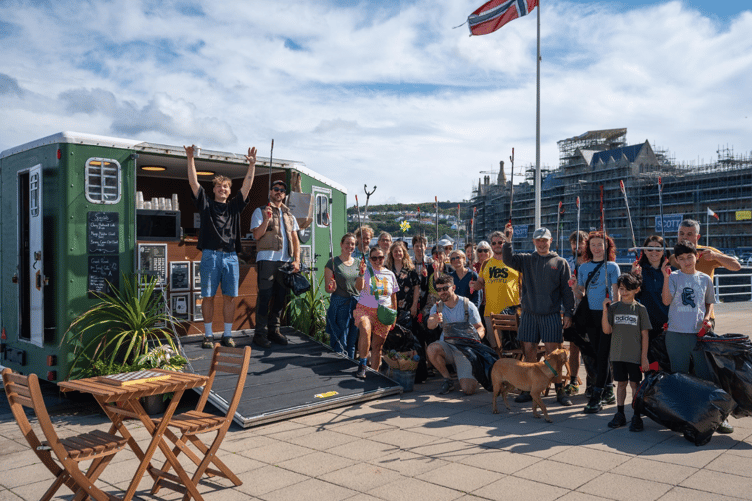 Litter pickers at the July clean-up event outside My Friends Place cafe. Photo: Thrtyfive Creative Studio