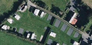 Camp site operated “without benefit” of planning permission