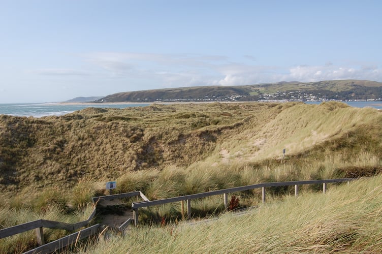 The dunes of Ynyslas Nature Reserve, where Ashley Wilbraham was lost, and the boardwalk he may have walked down.