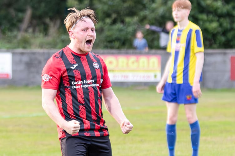 Rhys Alun celebrates scoring his first goal of the season