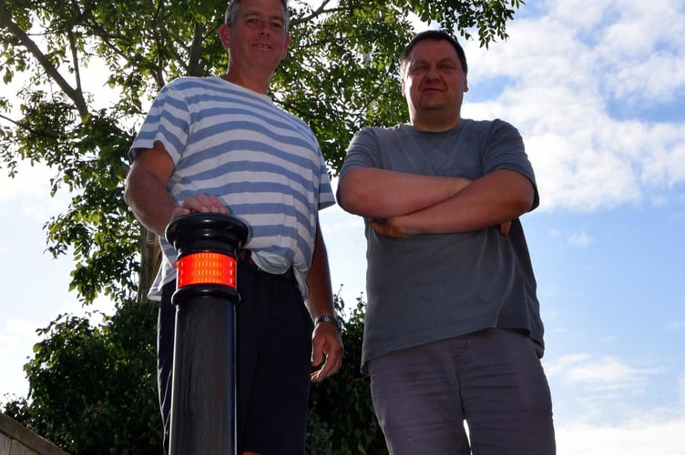Cllr Gareth Lewis and Pawel Banaszynski want turning restrictions from HGVs on the Clarach Road at Bow Street.