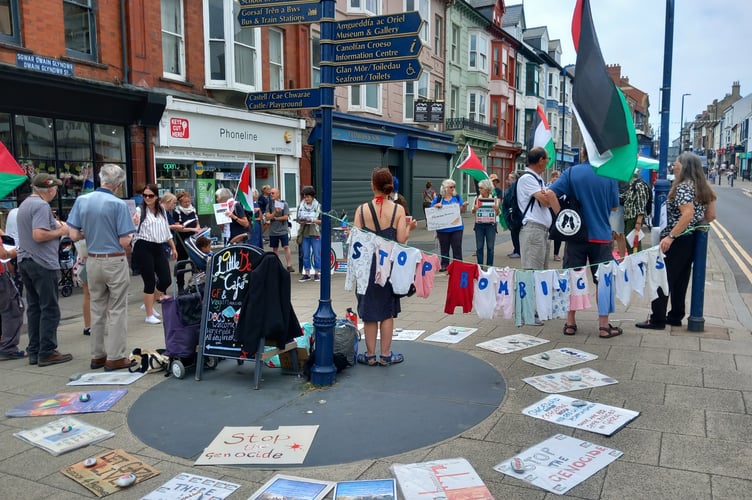 The protestors on Owain Glyndwr Square. Photo: Julie McNicholls Vale
