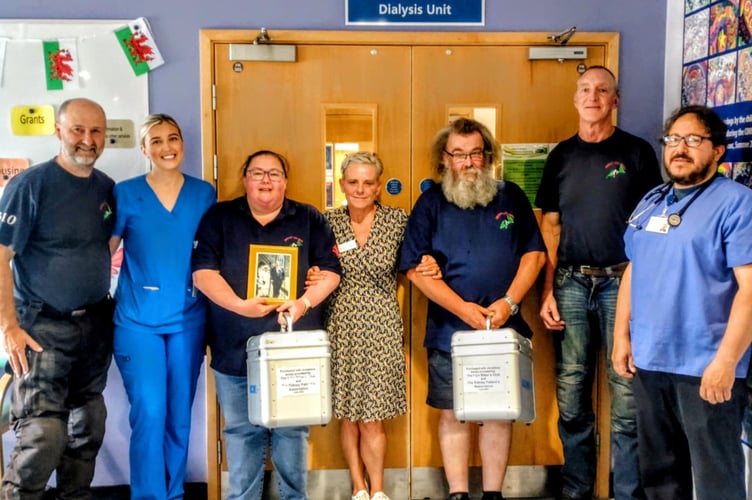 Beicwyr Llyn Bikers Motorbike Club present vital equipment to hospital staff