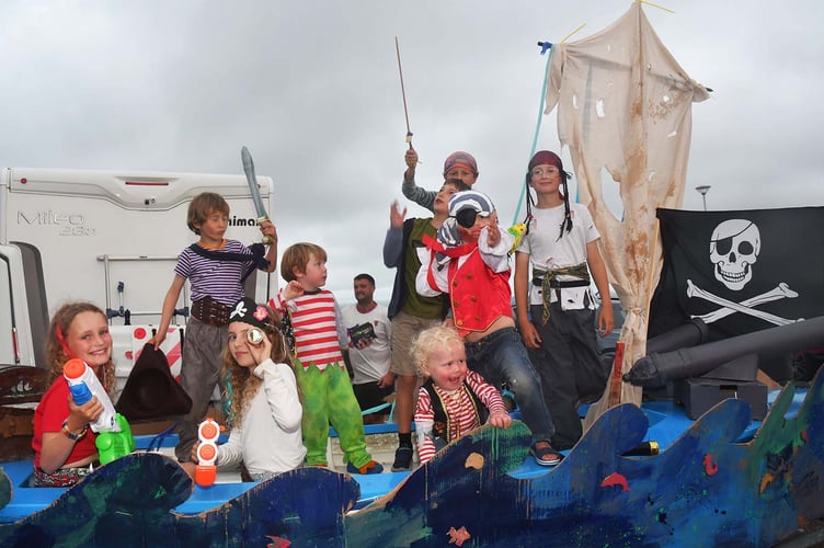 Dyfi Yacht Club 'Young Pirates on their 'Pirate Ship' and ready for the procession. Photo: Doris O'Keefe