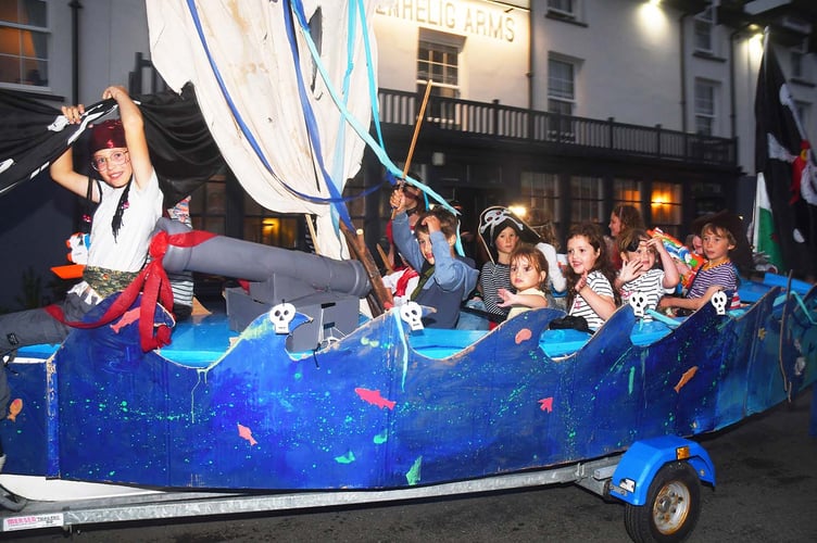 Young 'pirates' from the Dovey Yacht Club enjoy the carnival procession. Photo: Doris O'Keefe