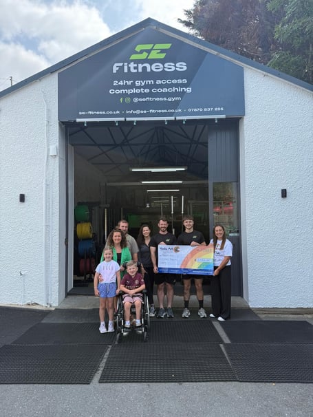 Libby Danton; Lizzie Danton; Alex Danton; Lewis Danton; Marketing Director, Stephanie Evans; Founder, Siôn Evans; Coach, Josh Davies; and Noah's Ark Regional Fundraiser, Briana Stayt.