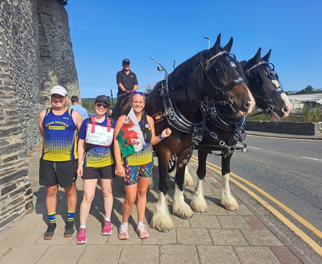 Epic relay around Ceredigion boundary raises thousands 
