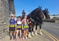 Epic relay around Ceredigion boundary raises thousands