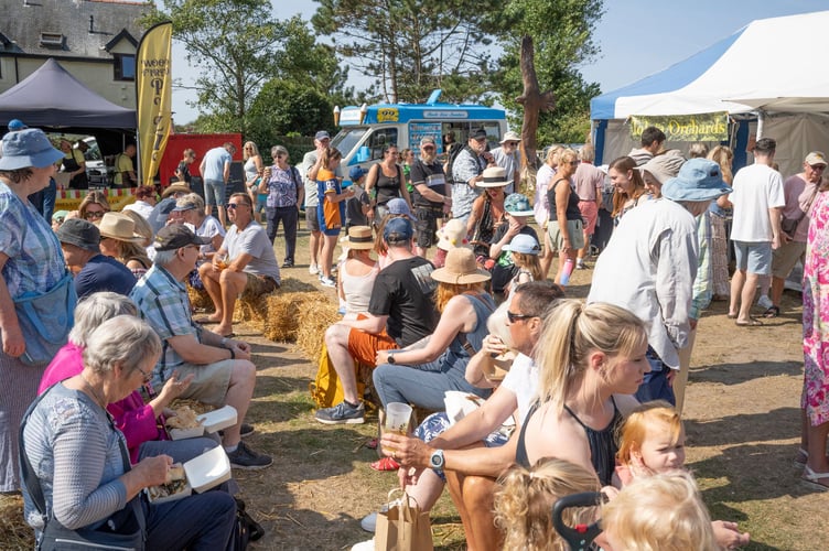 Hay bale seats in the sun at Aberdyfi Food Festival