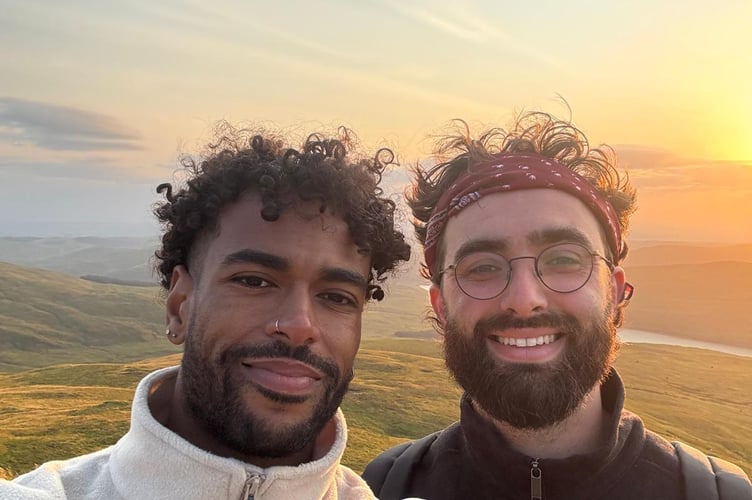 Former Cambrian News reporter Felix Arthur-John and fellow campaigner Reuben Walker