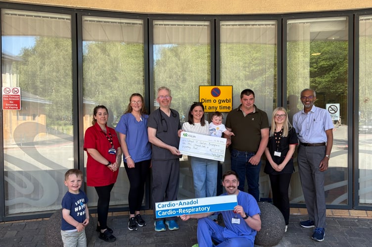 Back - Carwen Davies; Celia Bennett; Dr D McKeogh, Consultant Cardiologist; Ceris Jones; Twm; Calfyn Jones; Emily Woodward; and Dr K Joseph, Consultant Cardiologist.

Front - Dafydd and Arwel Griffiths.