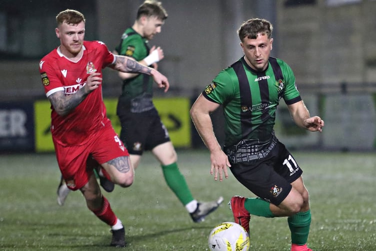 ABERYSTWYTH, CEREDIGION, WALES - 21st MARCH 2025 - Thomas Walters of Briton Ferry Llansawel pressures Zac Hartley of Aberystwyth Town during Aberystwyth Town vs Briton Ferry Llansawel in Round 29 of the JD Cymru Premier Play-Off Conference at Park Avenue, Aberysywth (Pic by Sam Eaden/FAW)