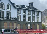Pub landlady's anger at sale of fire ravaged hotel