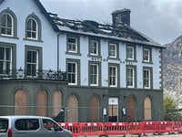 Pub landlady's anger at sale of fire ravaged hotel