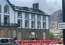 Pub landlady's anger at sale of fire ravaged hotel