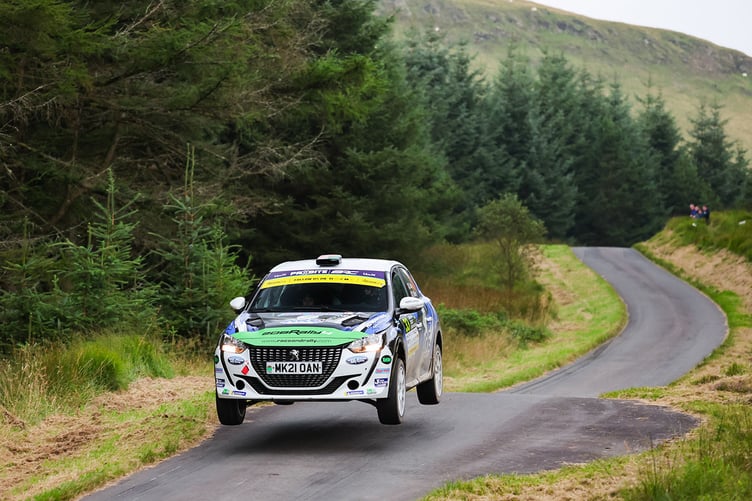 Llandysul's Ioan Lloyd takes to the air at last year's Rali Ceredigion