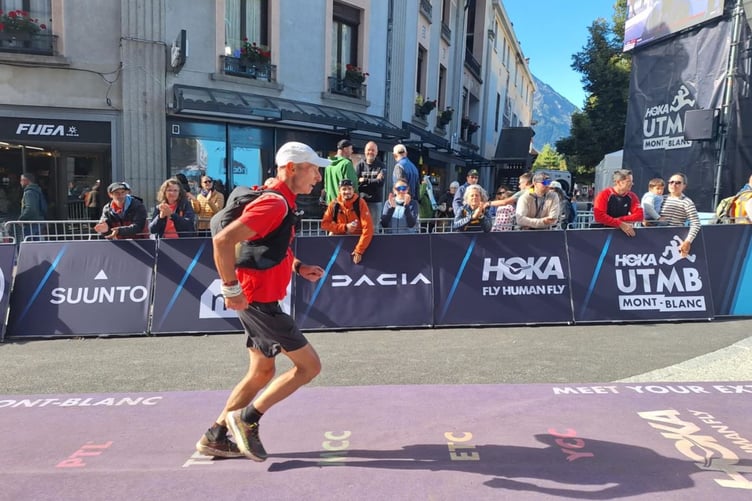 Dave Powell approaching the finish line at UTMB Mont Blanc