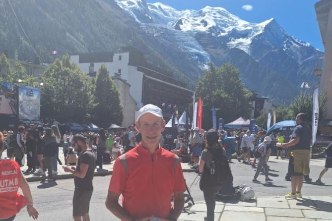 Dave with his trophy in front of a stunning backdrop
