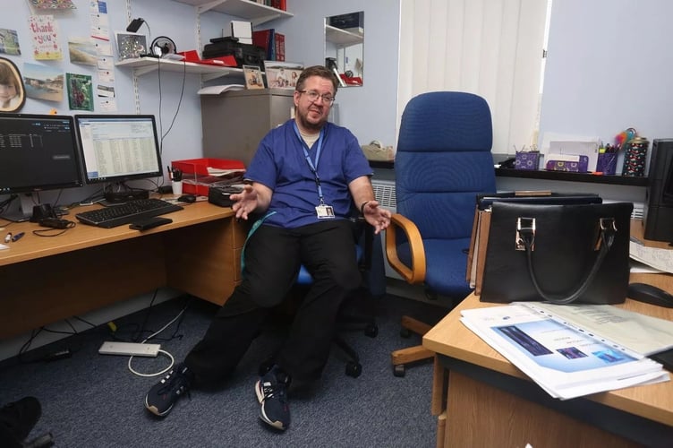FILE PHOTO - Surgeon Neil Hopper at The Royal Cornwall Hospital. A vascular surgeon who carried out hundreds of amputation operations before going on to have both his own legs amputated has been charged with fraud. Neil Hopper, aged 49, from Truro, has also been charged with encouraging someone else to remove the body parts of others. Devon and Cornwall Police issued a statement this morning saying: "Following an investigation by Devon and Cornwall Police which began in February 2023, a vascular surgeon from Cornwall has been charged with three criminal offences.