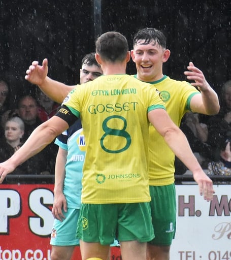 Morgan Owen congratulates Danny Gosset who scored twice against Barry