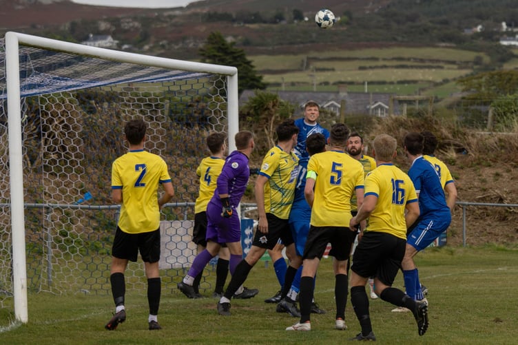 Goalmouth action during the close encounter between Nefyn and Llanuwchllyn at Cae'r Delyn on Saturday