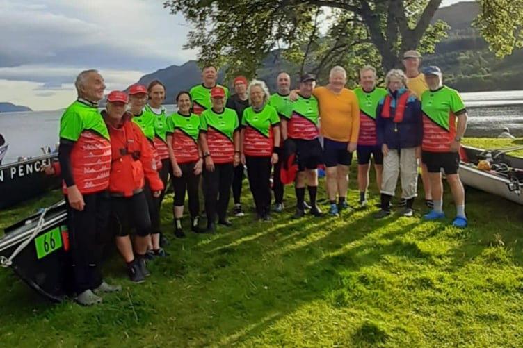 Madog Yacht Club members in their new rowing strip